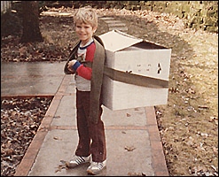 scott planson as a child moving a box